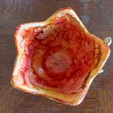 Brass cup in the shape of a bird and flowers