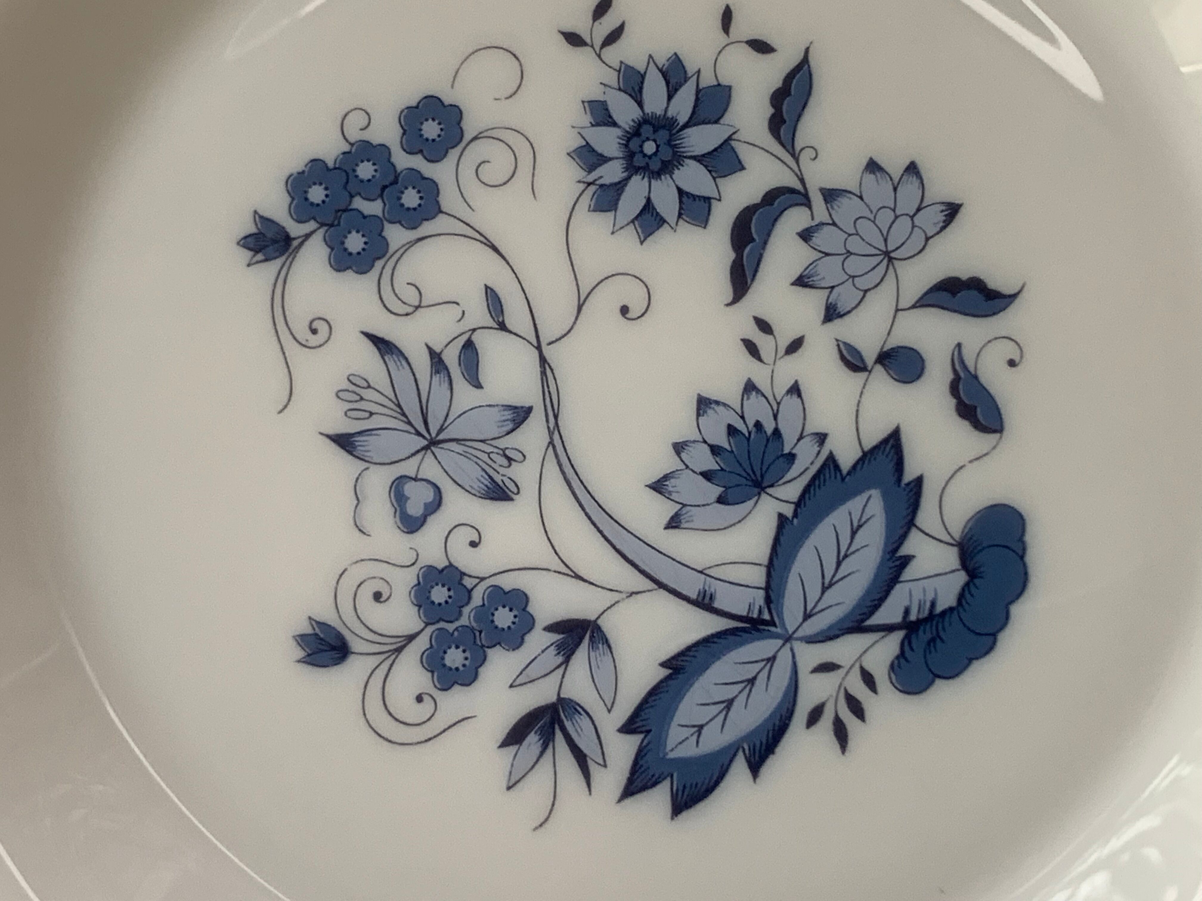 3 bowls and 5 blue plates