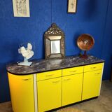 Vintage yellow sideboard, and black marble top.