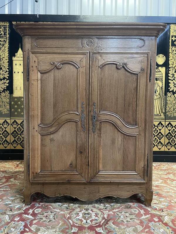 Louis XV period low cabinet in solid oak