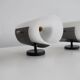 Set of four wall lights in white plexiglass and perforated black metal.