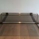 Table basse en chrome, cuir et verre fumé