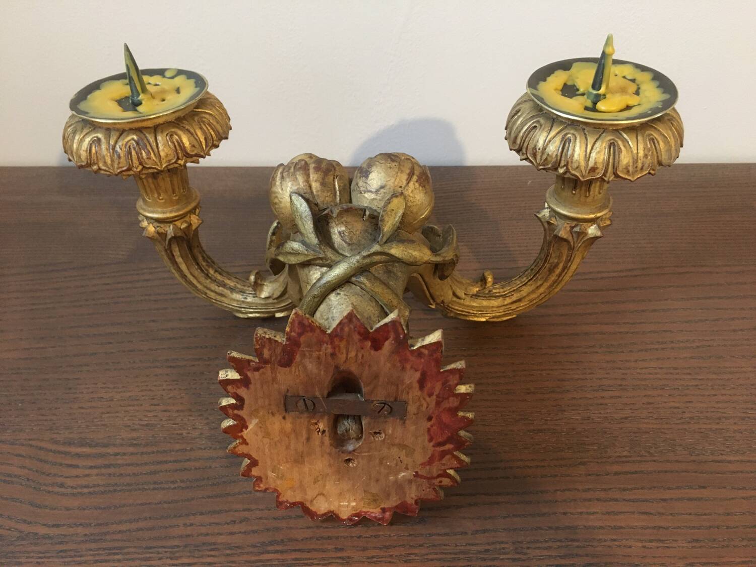 Golden wall candle holder