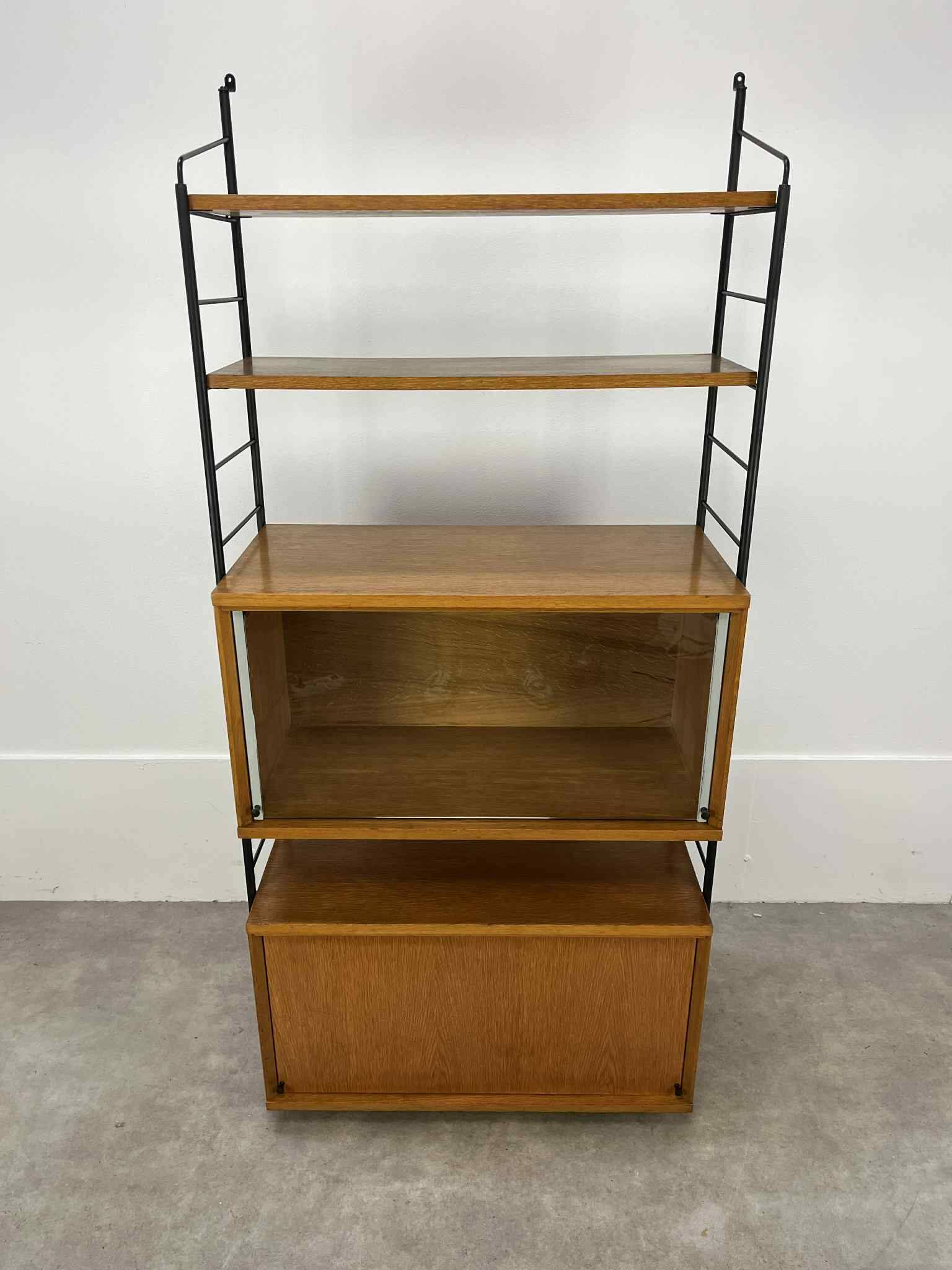 Modular shelf from the 1950s, wood and metal, vintage.
