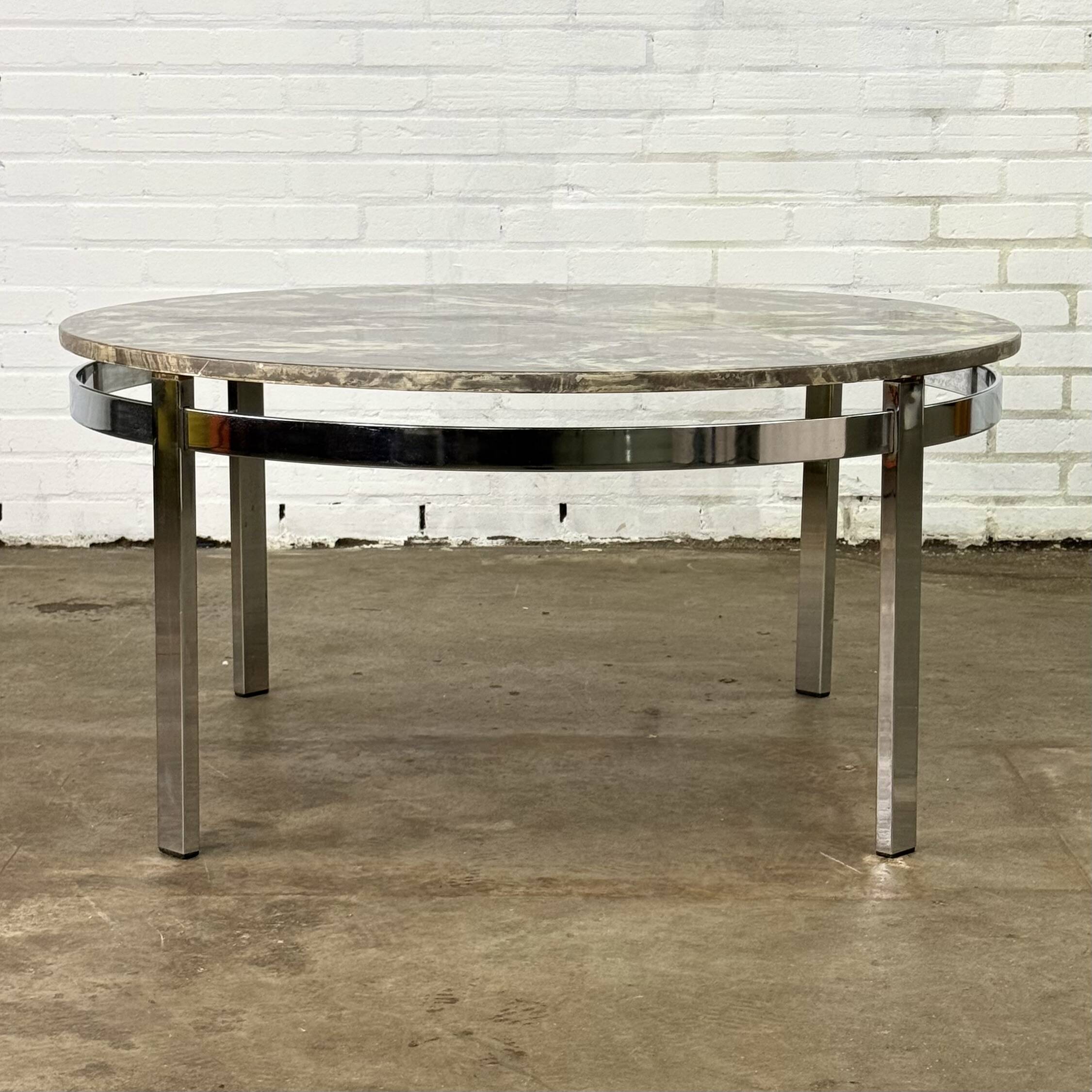 Round vintage coffee table with marble top and chrome base