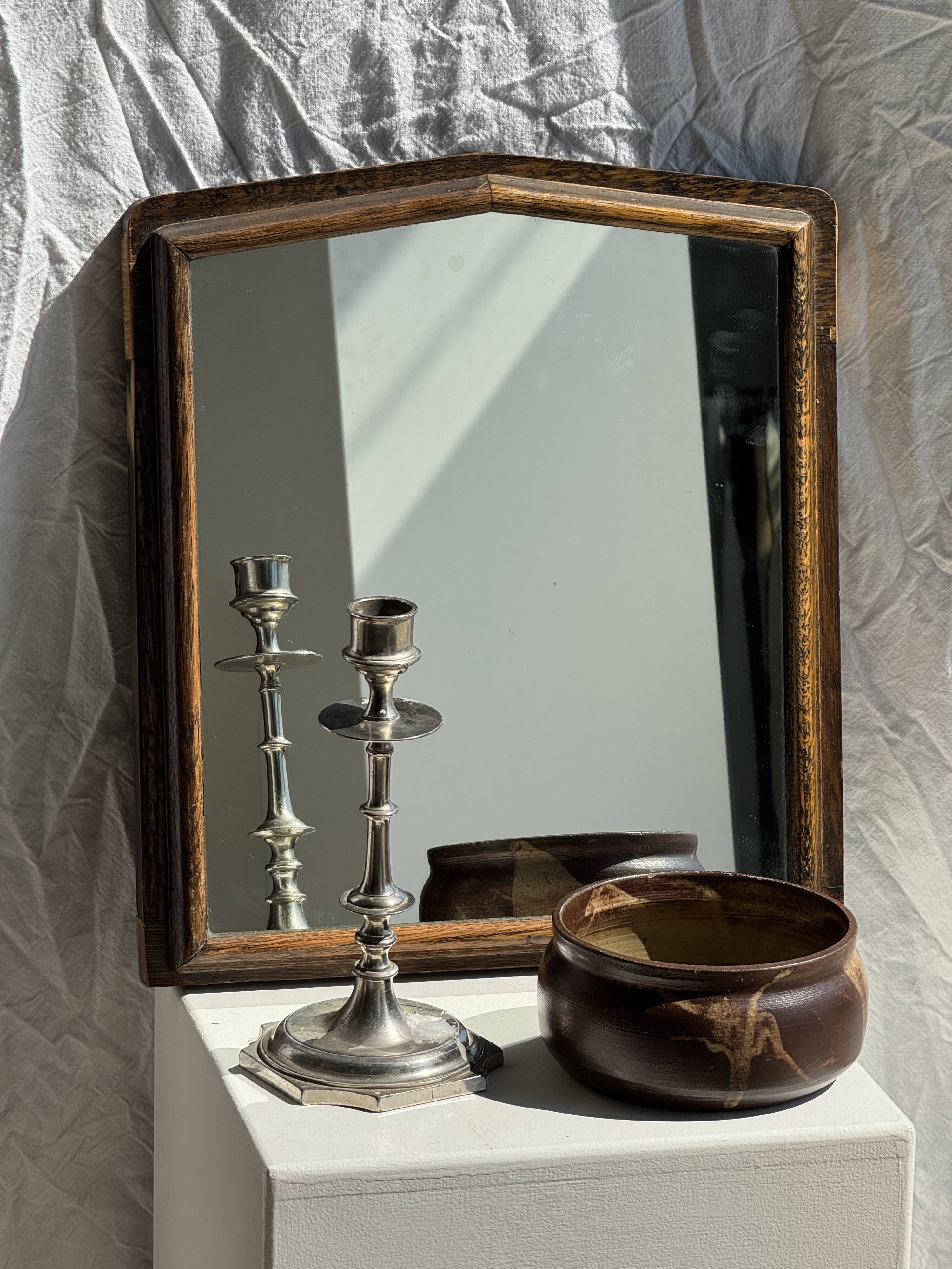 Small antique English rectangular mirror with pediment and oak frame