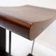 Vintage wooden and metal stool in the style of the "T" model by Pierre Chareau.