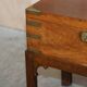 Antique hardwood military campaign desk with writing slope.