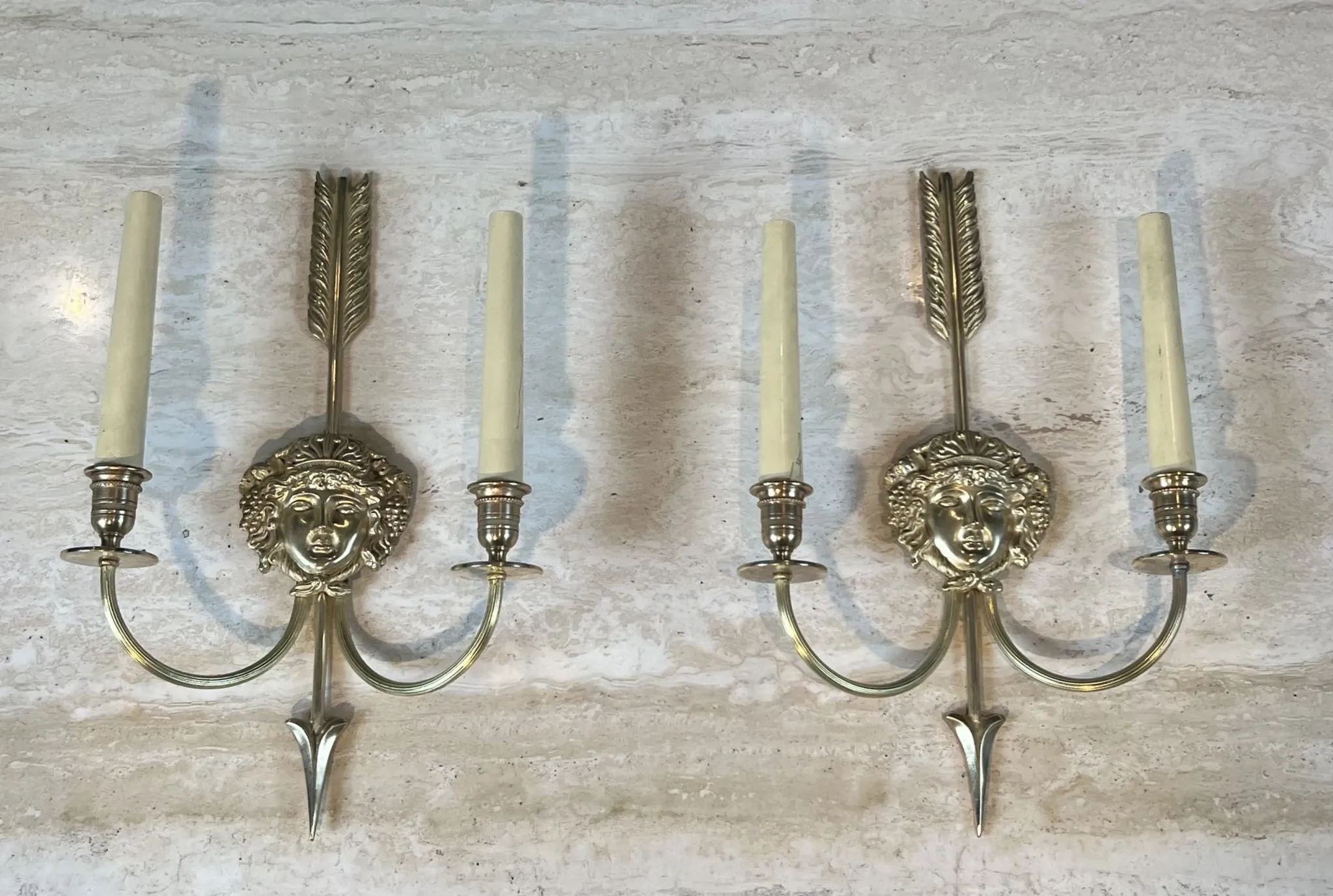 Pair of Two-Arm Bronze Wall Lights with Arrow and Mask Decoration