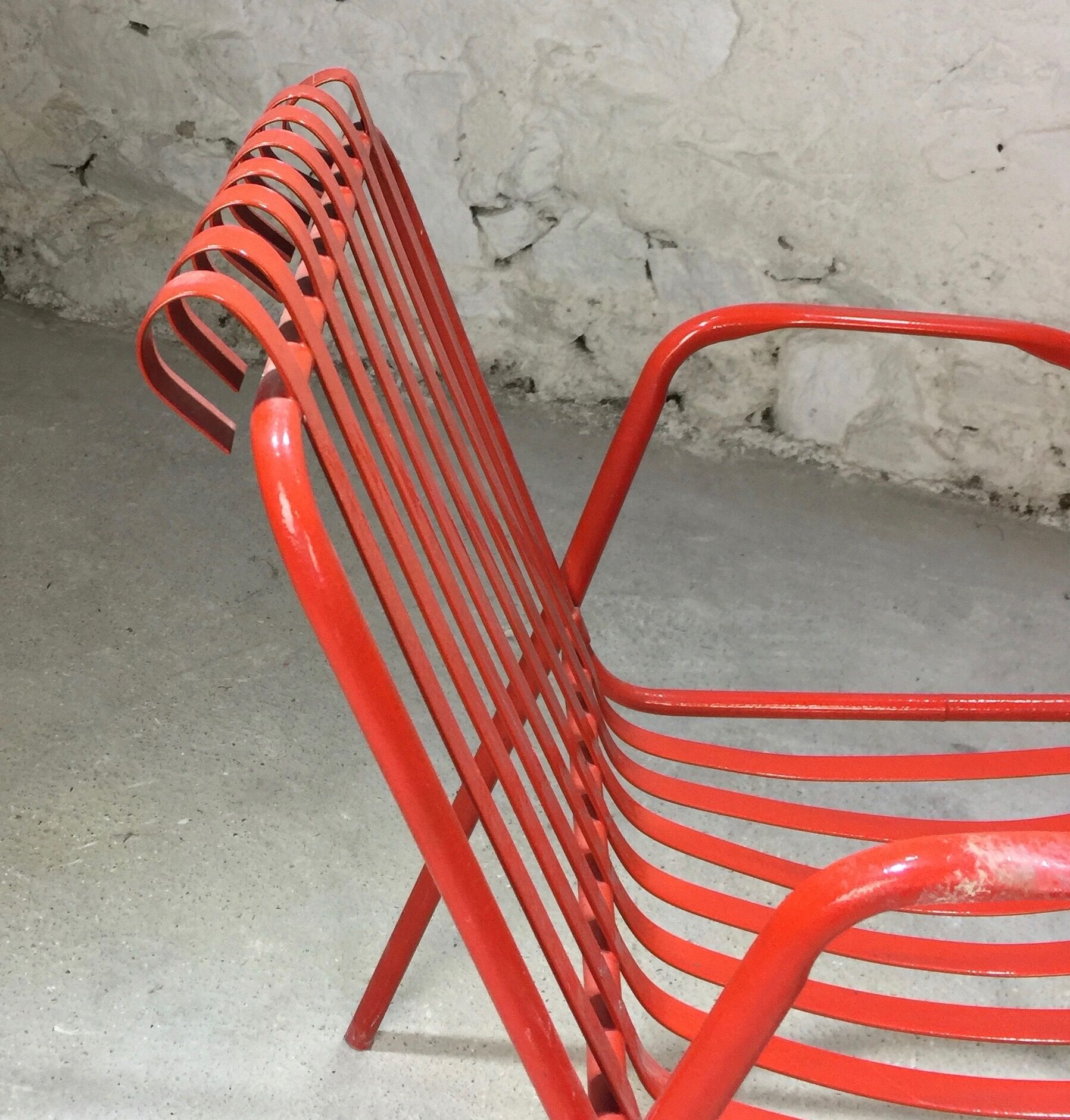 1960s red metal chair published by Stil Garden