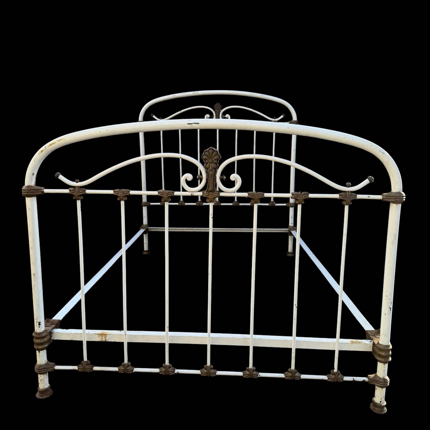 Antique wrought iron bed from the 1900s