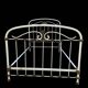 Antique wrought iron bed from the 1900s