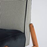 Black and white armchair without armrests