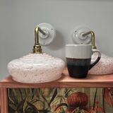 Pair of pink globe wall lights