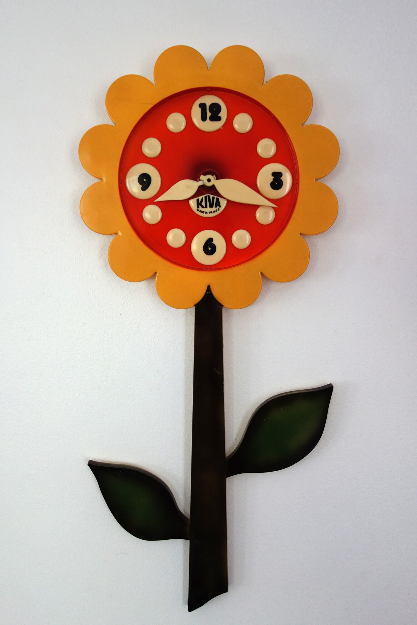 Vintage Kiva flower wall clock