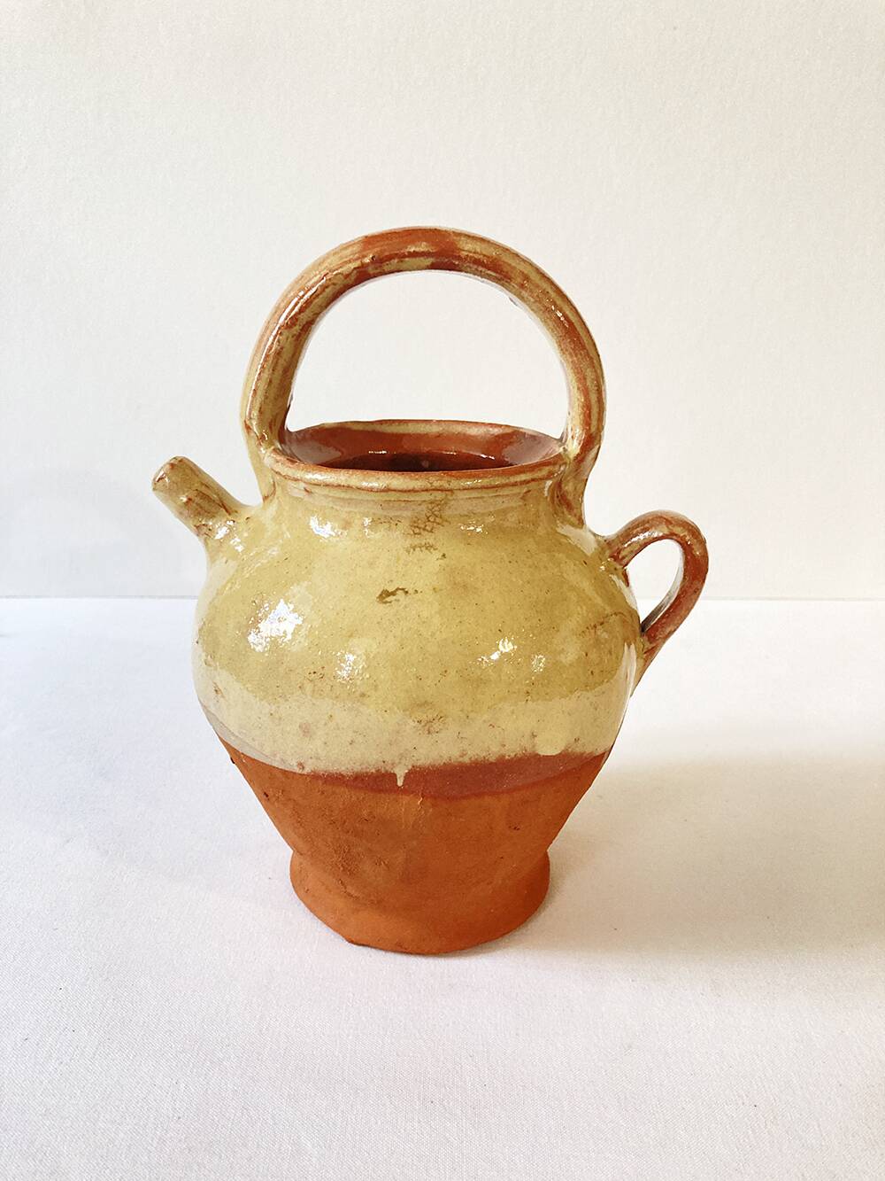 Antique Provençal jug / goat in red stoneware with yellow enamel