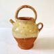 Antique Provençal jug / goat in red stoneware with yellow enamel