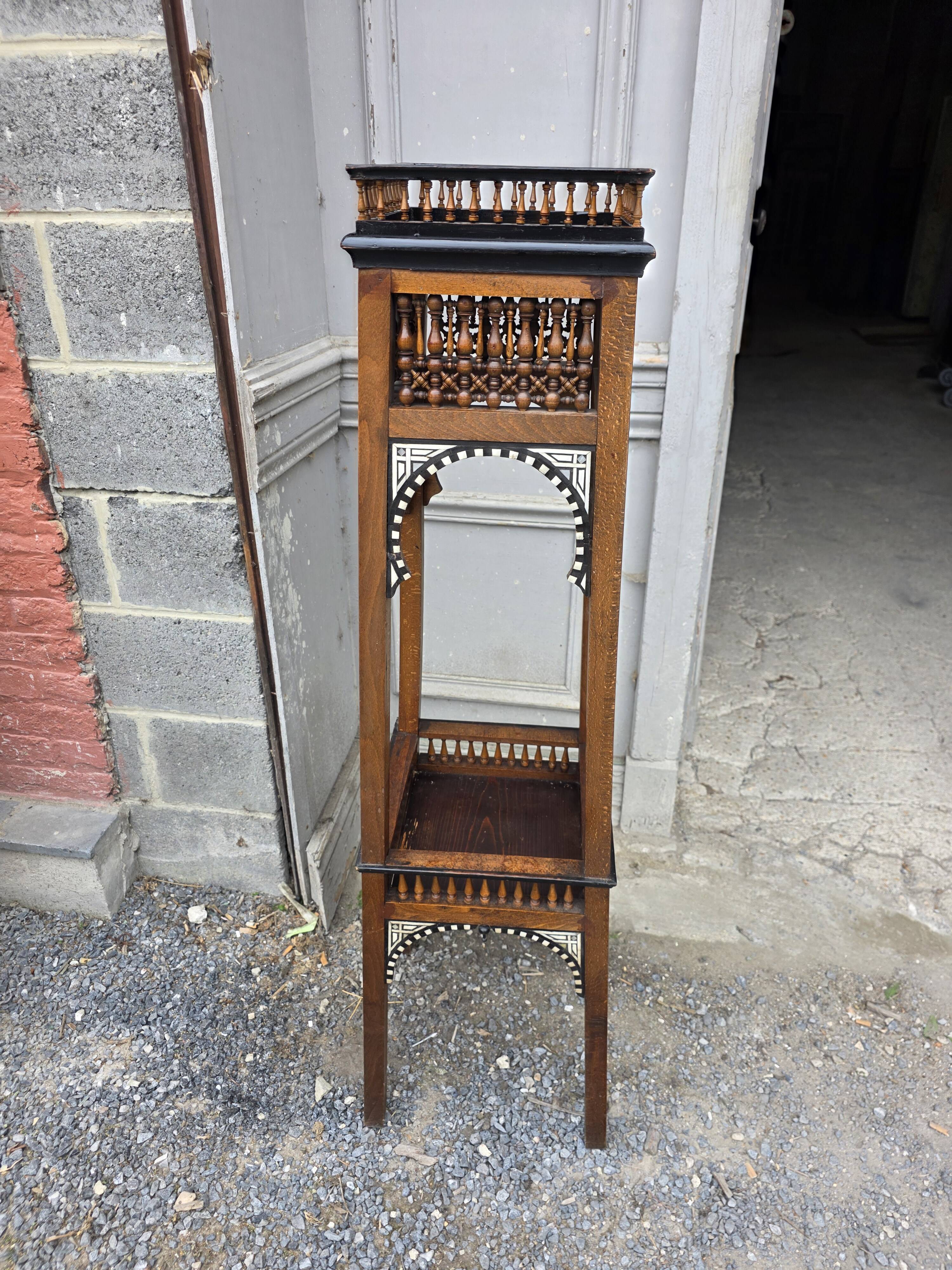Antique pedestal from the early 20th century.