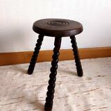 Brutalist tripod stool with twisted legs