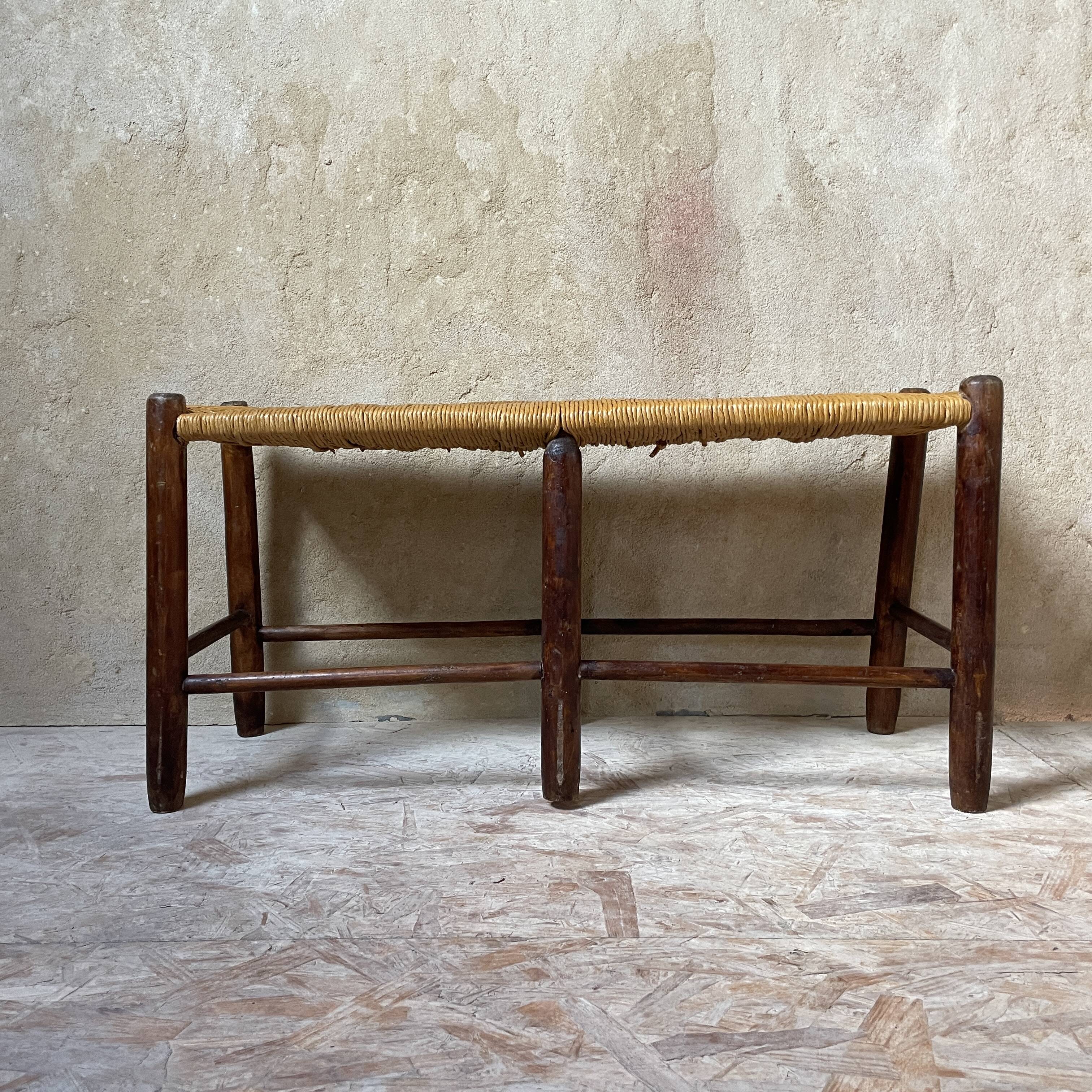Wooden bench and rustic straw