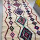 Moroccan Berber rug in cream wool with multicoloured diamonds – 250 × 147 cm