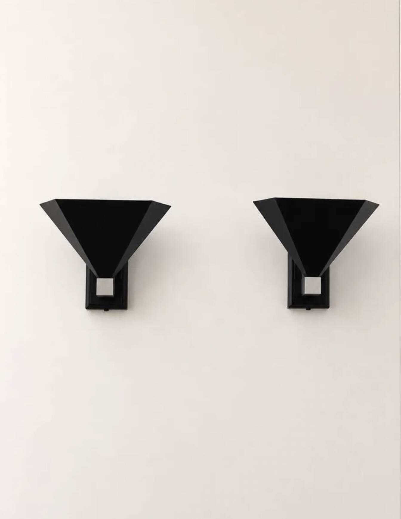 Pair of vintage wall sconces, matte black metal, Italy 1980.