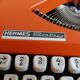 Hermes Baby orange typewriter