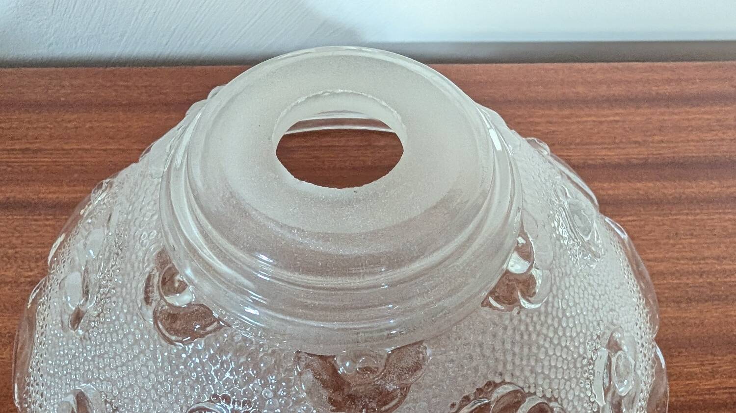 Moulded glass lampshade with floral decoration, granite texture.