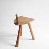 Brutalist tripod stool in carved wood, 1950s