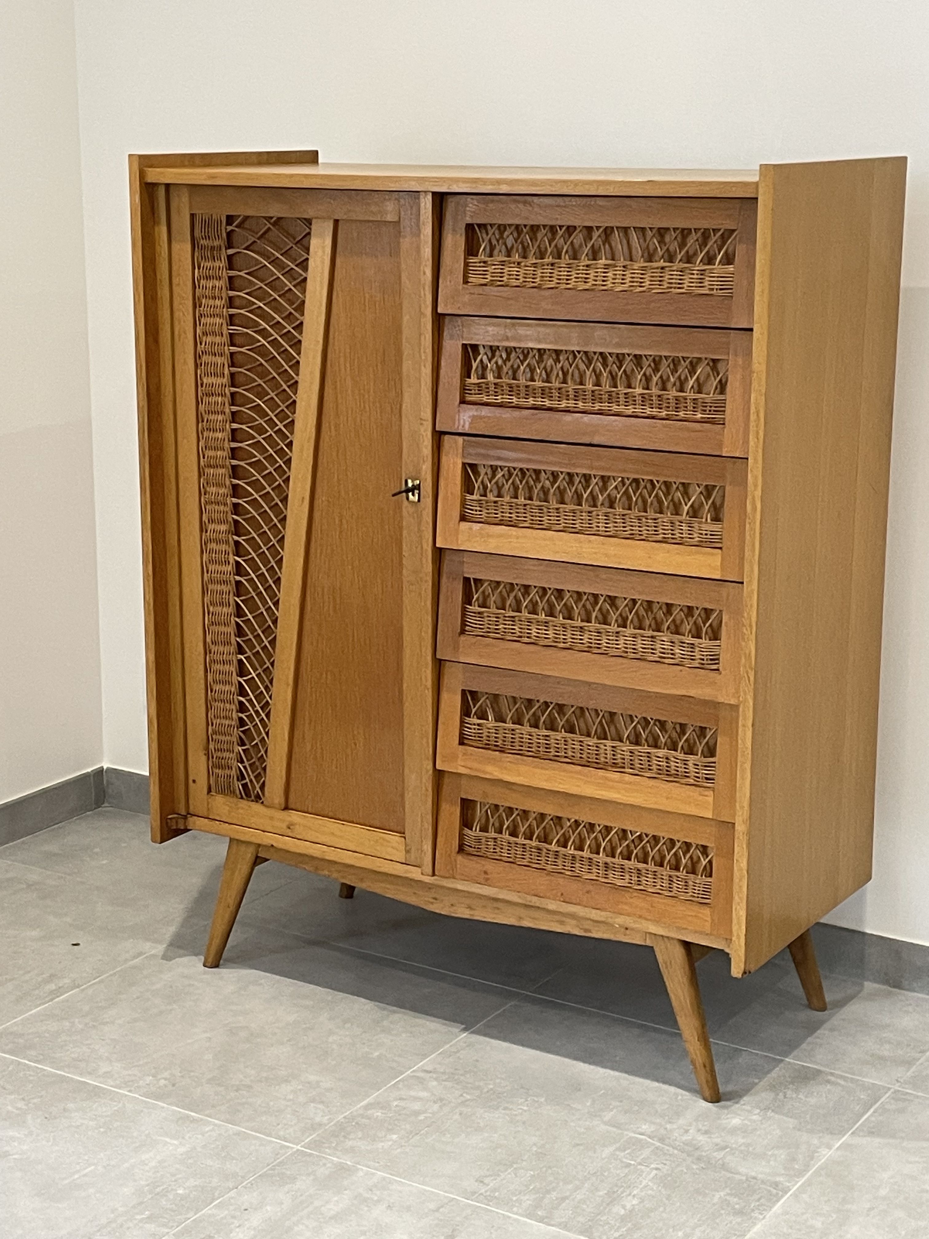Children's wardrobe in wood and rattan with so-called Parisian compass feet