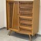 Children's wardrobe in wood and rattan with so-called Parisian compass feet