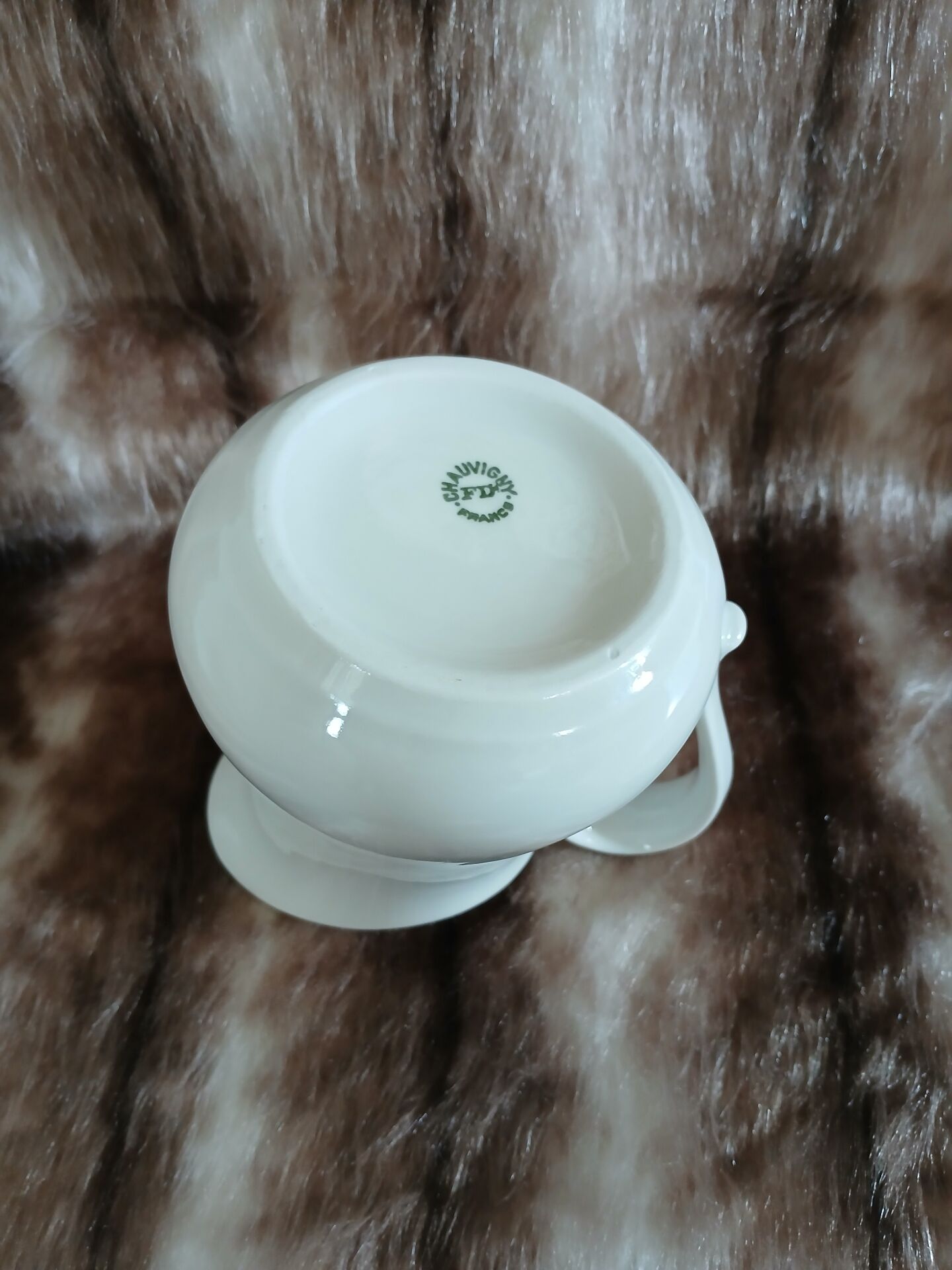 2 antique pitchers in white earthenware