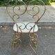 Vintage heart chair from the 1950s Hollywood Regency in gold metal.