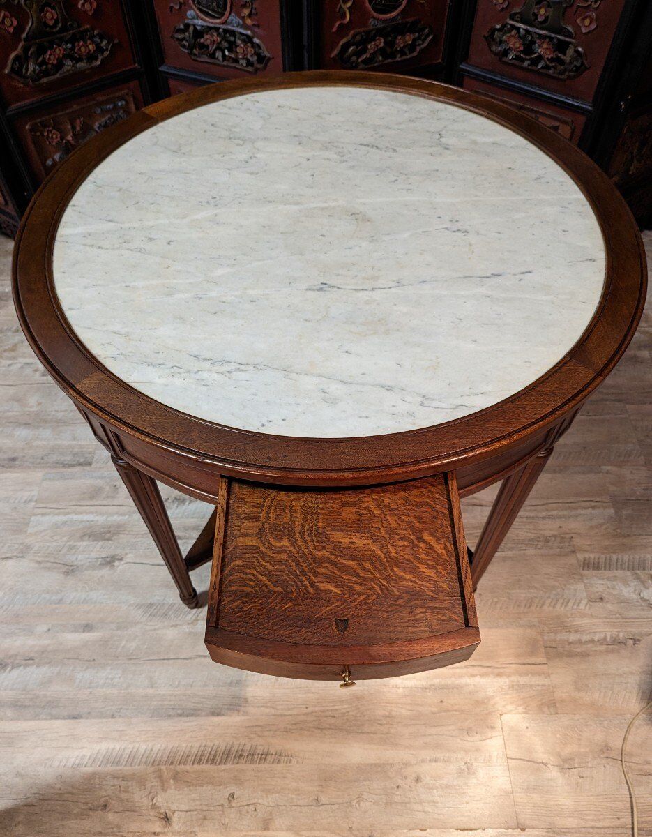 Round mahogany pedestal table Louis XVI