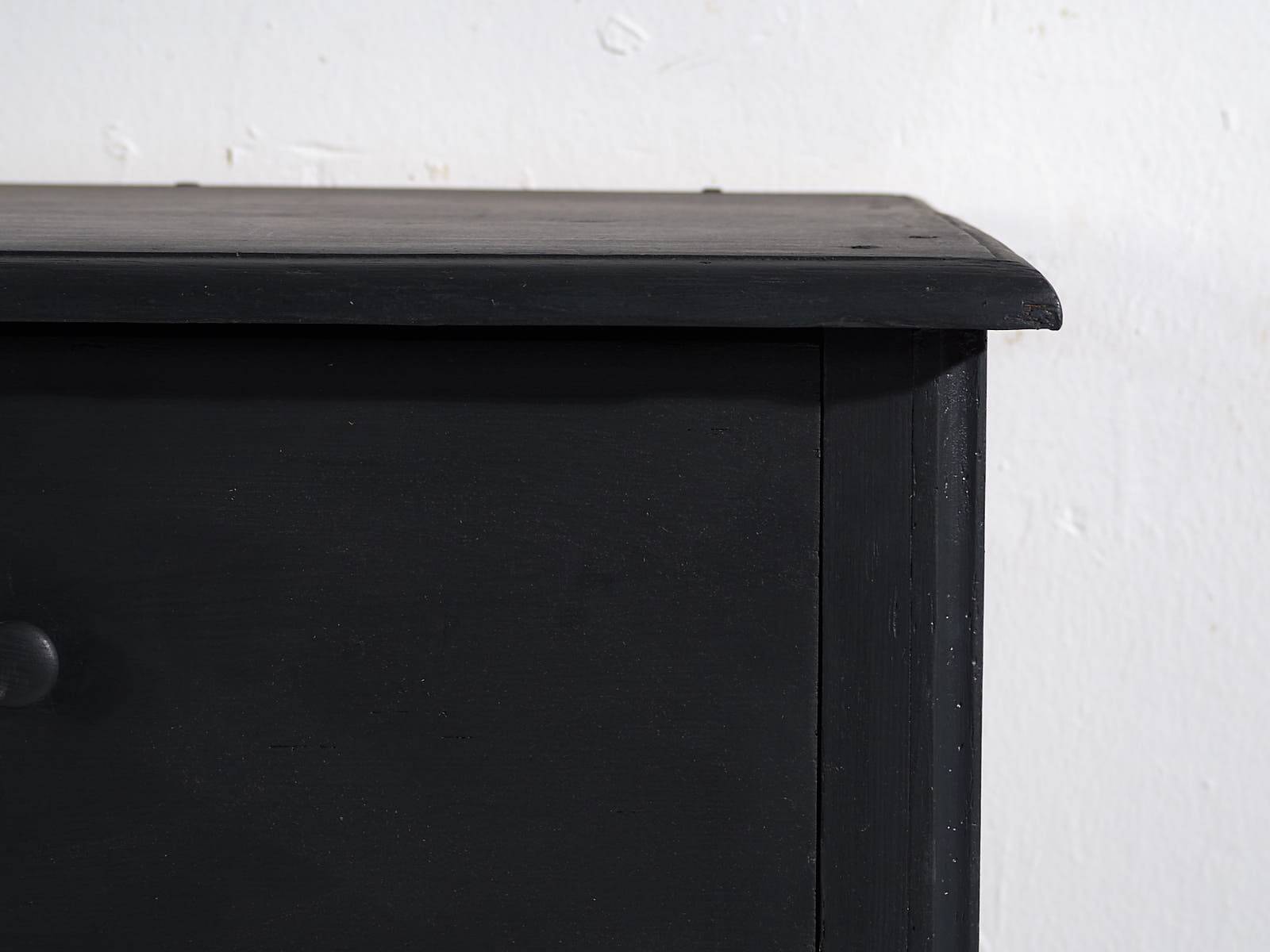 Antique chest of drawers in dark tones (c.1920)