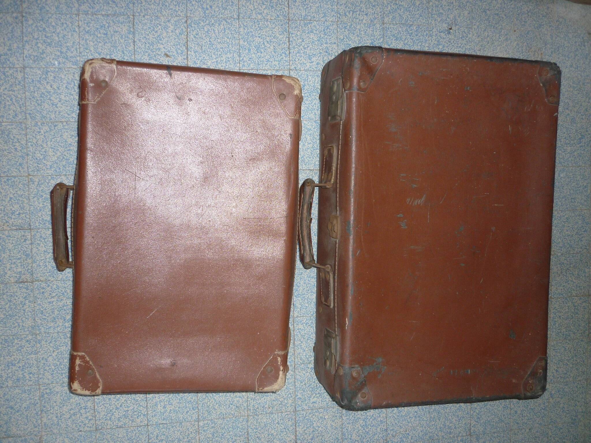 Pair of red suitcases from the 1950s