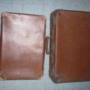 Pair of red suitcases from the 1950s