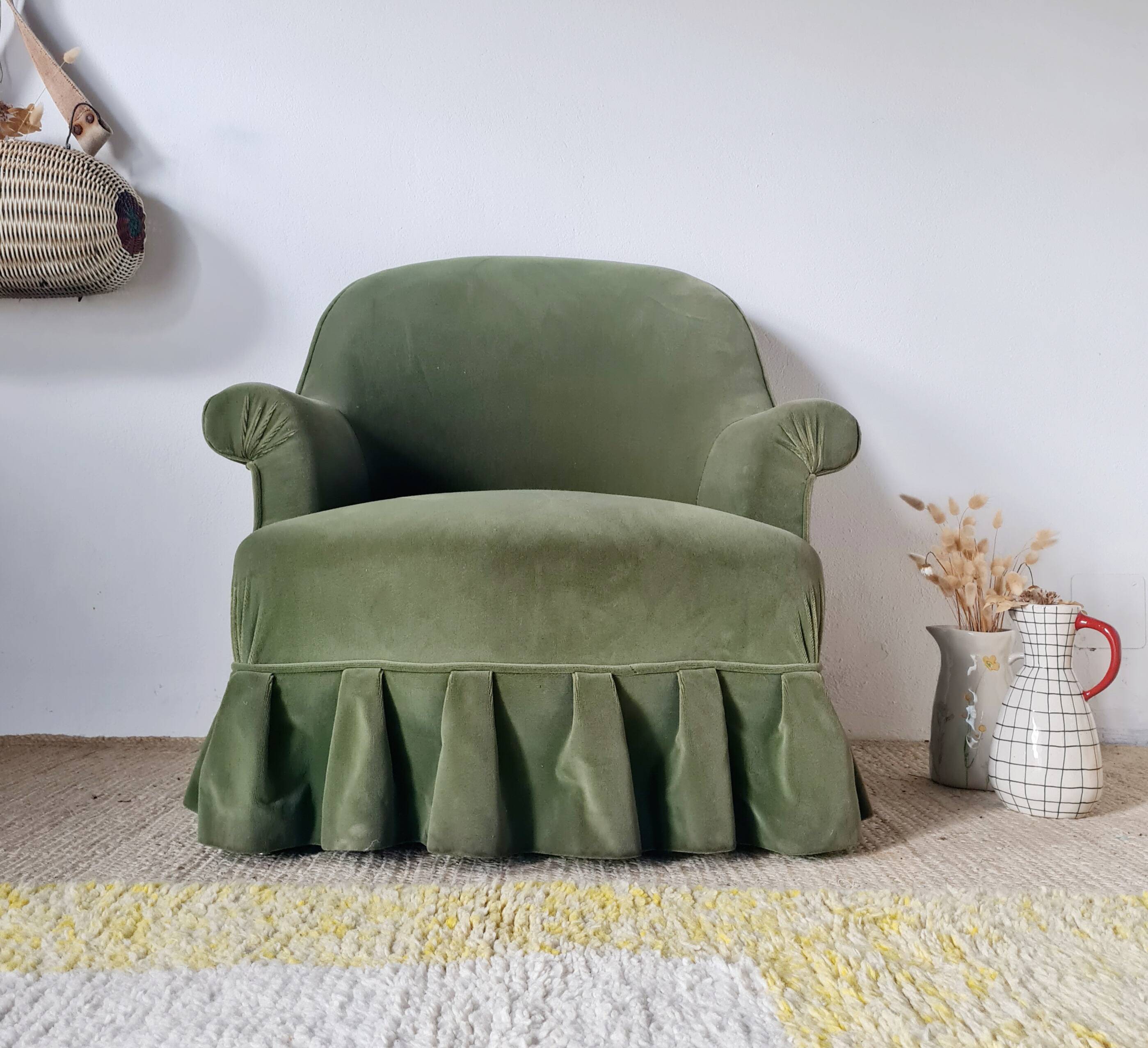 Green velvet armchair