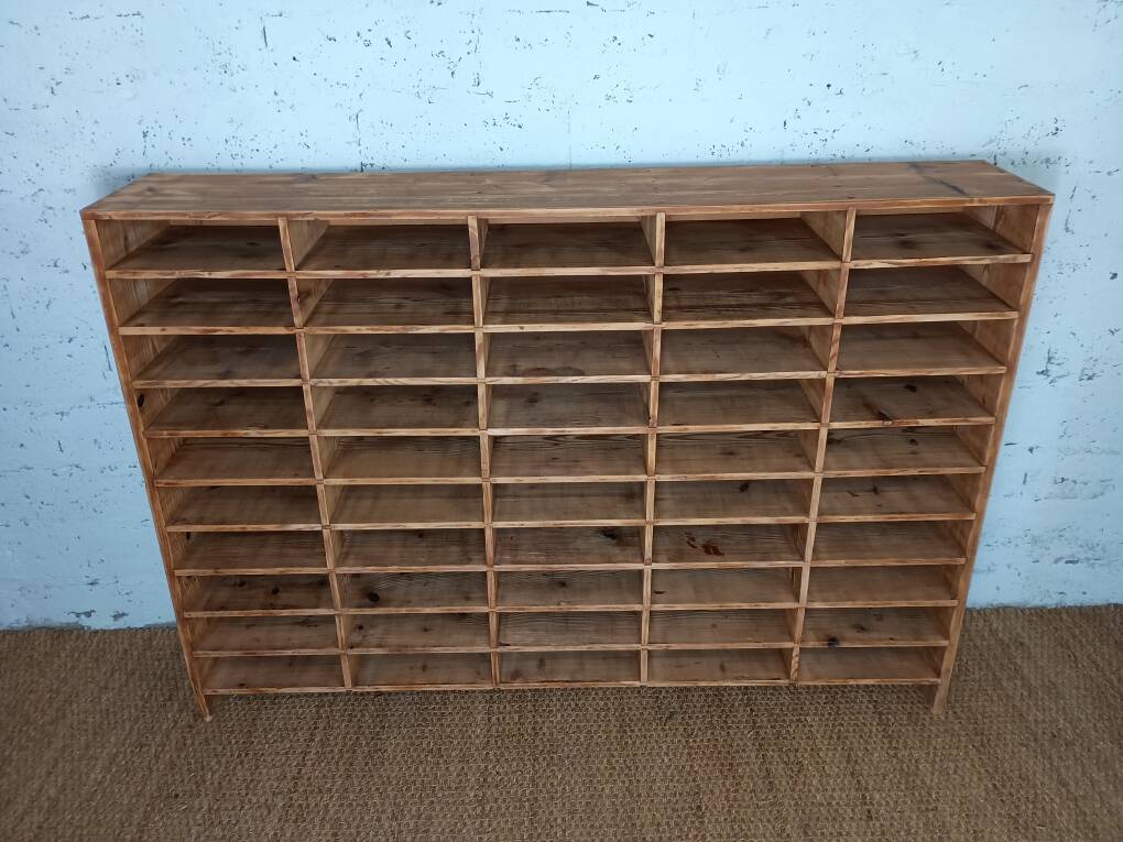 Wooden sorting cabinet with 50 compartments.
