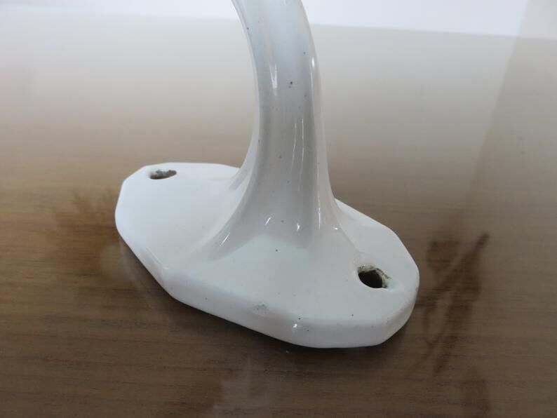 Pair of white cast iron patères art deco 30 40