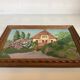 Small painting of a flowered house in oil on cardboard.