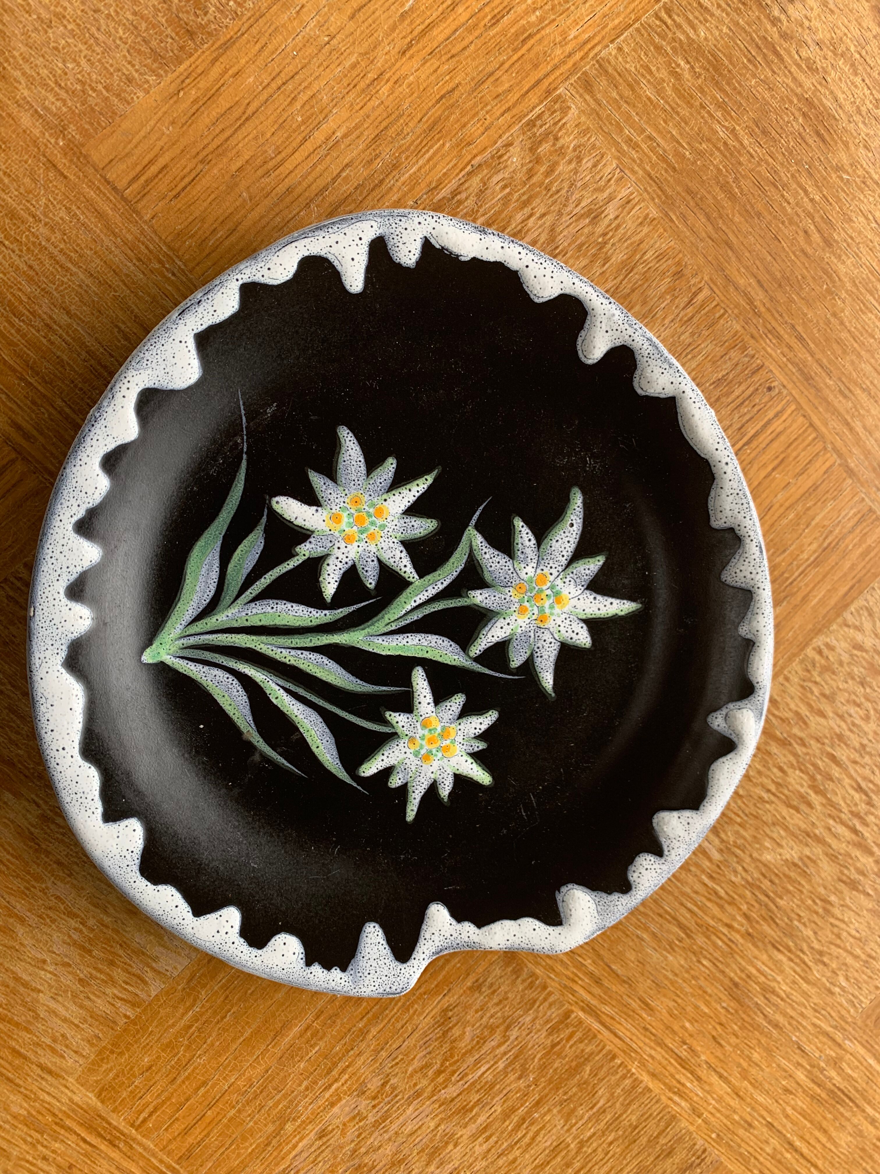 Two plates, decorative dishes edelweiss patterns in glazed ceramic signed SF vintage