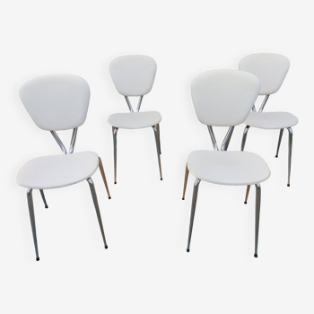 4 white and metal chairs