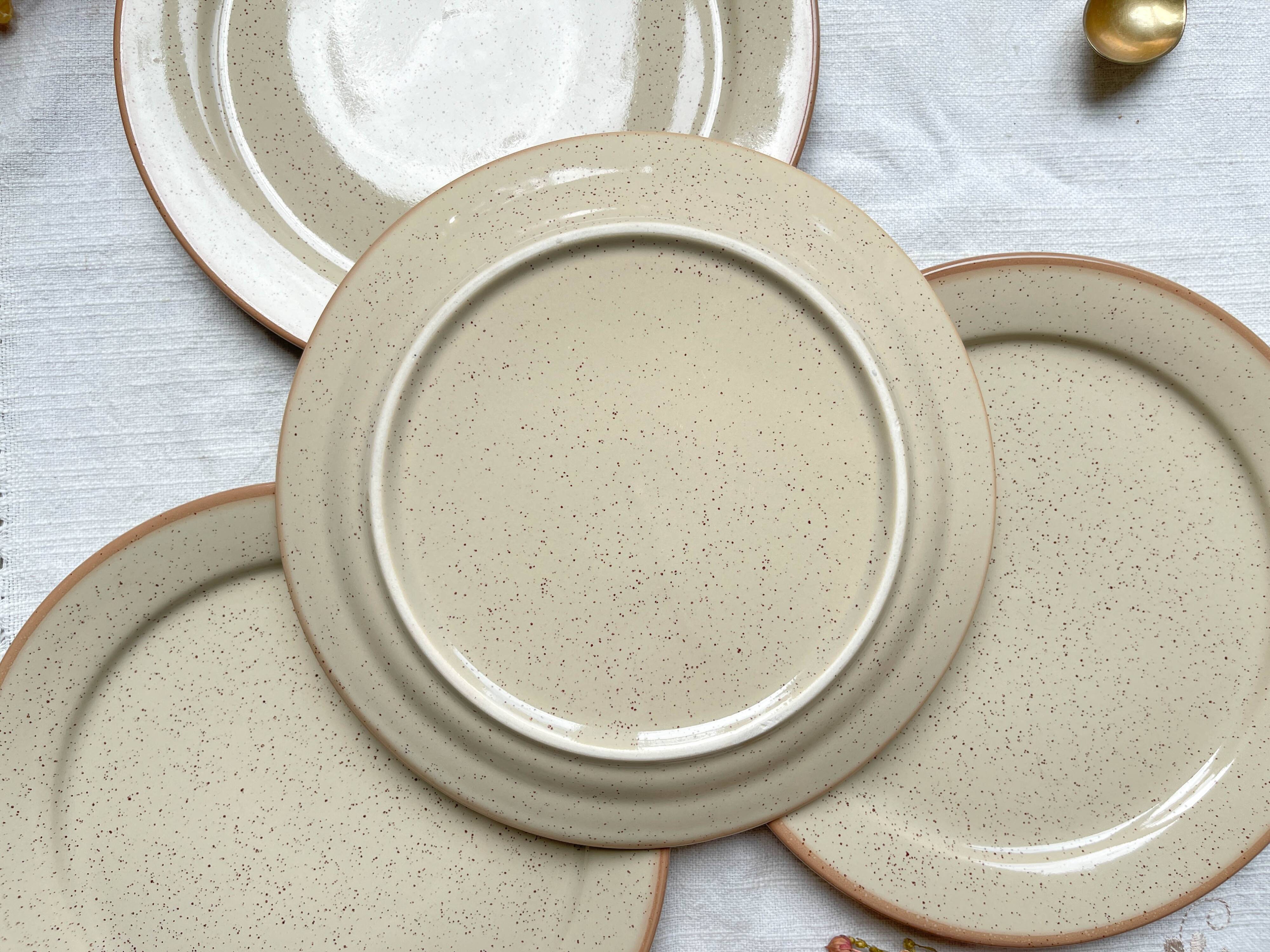 4 Small plates in speckled stoneware, Tulowice style, mid-century, 20th century