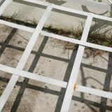 Old wrought iron bed bench