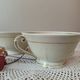 Two retro country-style porcelain tea cups, Former Royal Manufacture