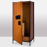 Pair of mahogany veneer and black lacquered iron cabinets. 1950s.