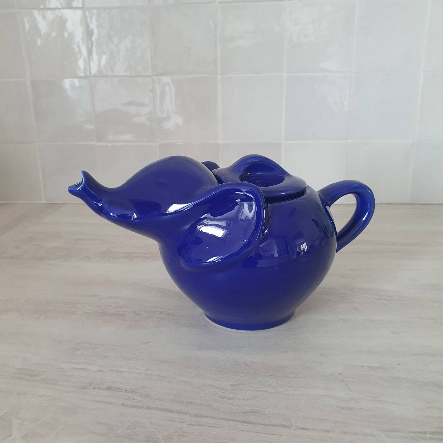 Elephant teapot by Lipton in royal blue.