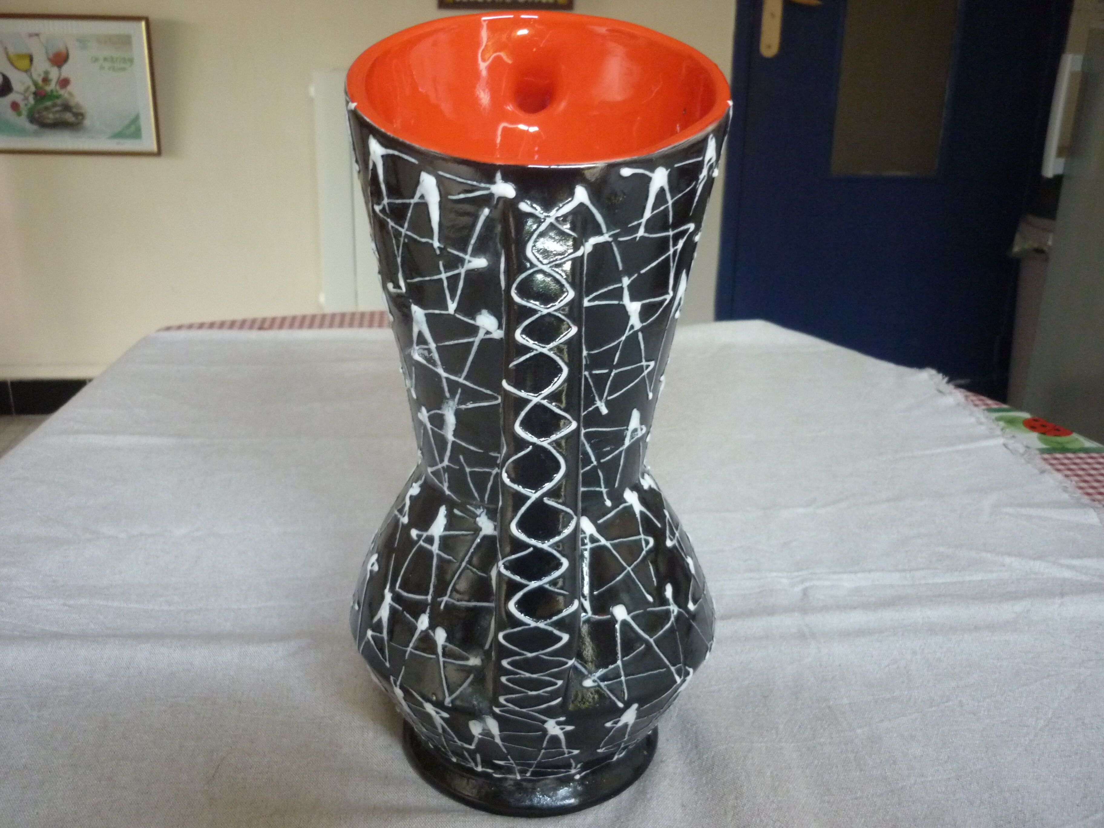 Vintage dark streaked white interior red vase