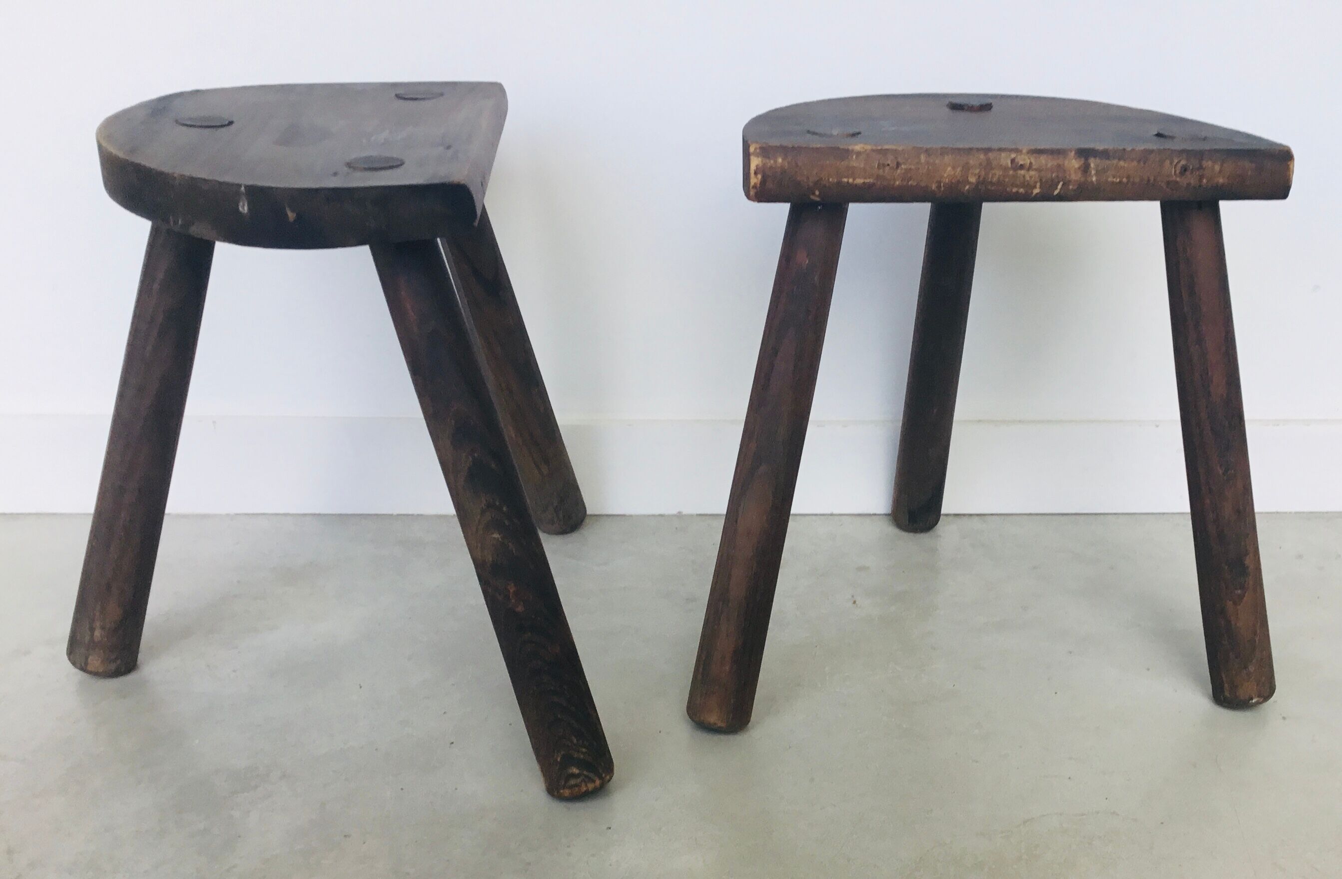 Pair of vintage tripod farm stools